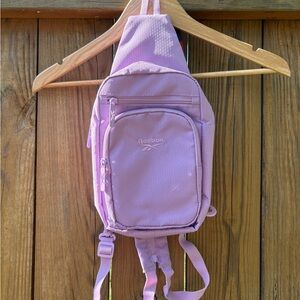 Reebok Purple Sling Style Adjustable Backpack